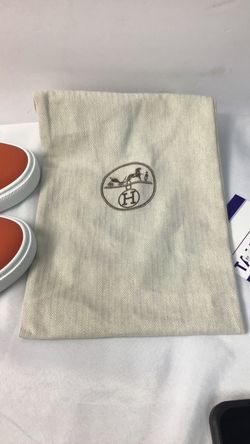 Hermès day sneaker Epson orange authenticated by entrupy