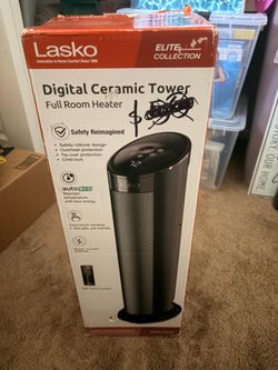 Reliable Lasko ceramic tower heater in black. This full room heater has a digital display, safety rollover design, overheat protection, and tip-over p