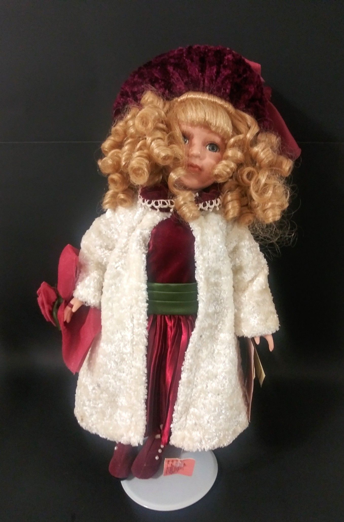 Antique porcelain doll red dress