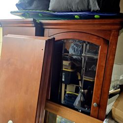 Wooden Entertainment Center With Glass Doors