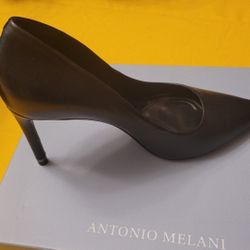 Antonio Melani Black Heel size 7M. Only worn once.