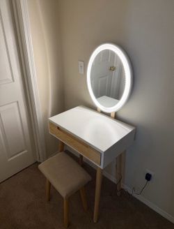 Vanity with mirror and lights