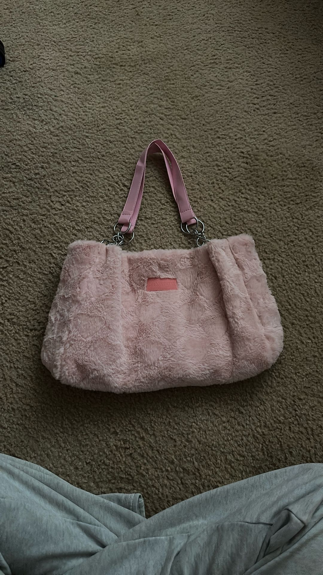 Pink fuzzy purse
