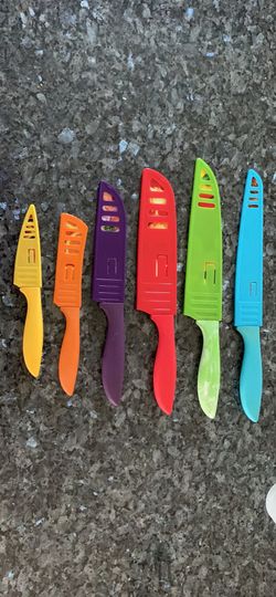Set of 6 knives with covers-lightly used