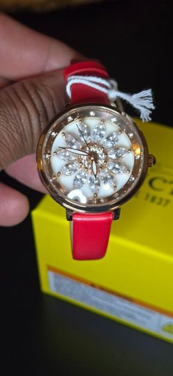 Invicta Celestial Lady 34mm Rose Gold Tone Case Rose Gold Metal Dial Red Band.