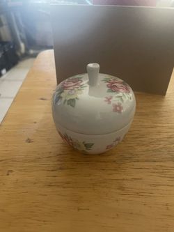 try Get Holder$5.. With Red And Yellow Flowers On It Very Vintage.