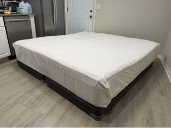 High quality king size bed! Mattress & low profile box springs. CAN DELIVER!