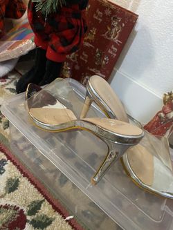 Clear and silver open toed shoe