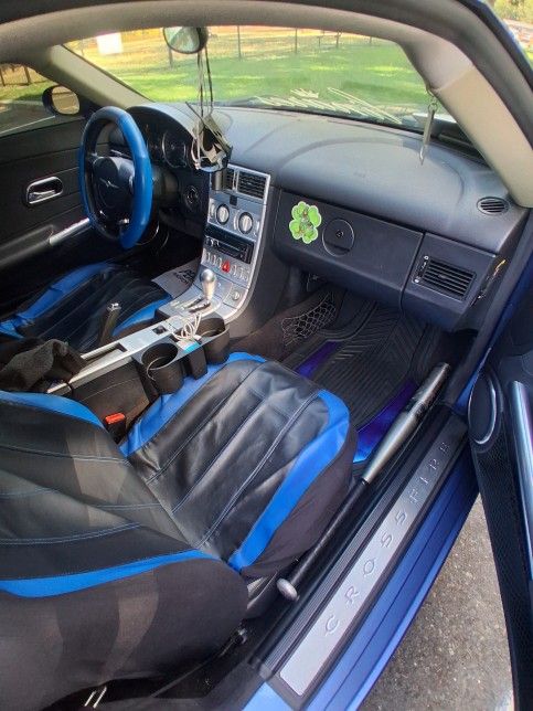 I'm selling my Chrysler Crossfire V6 automatic. Exhaust. Modified. Inlets. Hairline. Only takes up a fan relay. That's all I'm selling because I have
