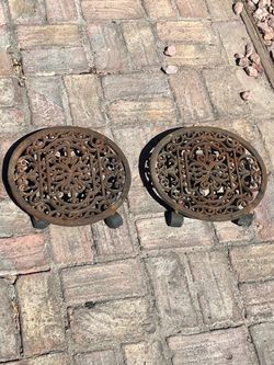 Two heavy duty metal outdoor round plant rolling stands for $12