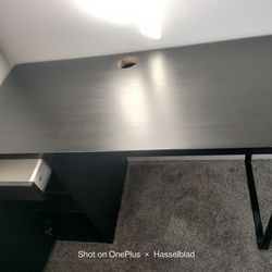 Black desk and office chair
