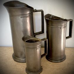 Antique pewter European  Measuring Pitchers. Set Of 3