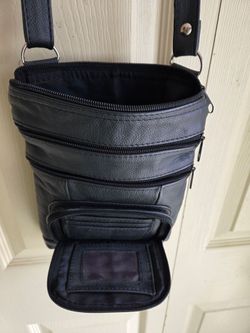 Black purse over the shoulder, black