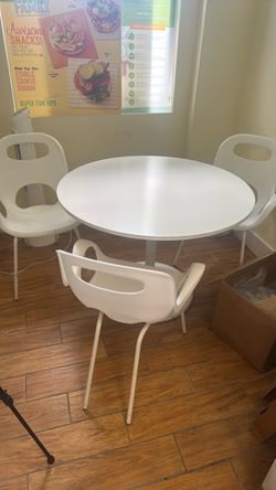White table with 4 chairs