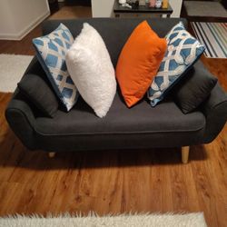  A CUTE BLUE SOFA CAN HOLD 300 POUND PERSON