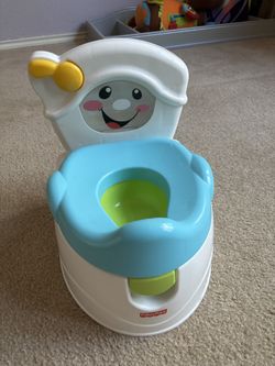 Fisher Price Learn To Flush Musical Training Potty.
