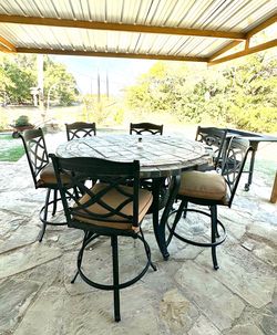 Beautiful Outdoor Table With Swivel High Chairs 
