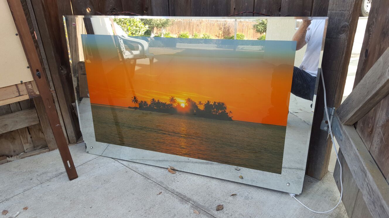 Mirror with Sunset that lights up and makes soothing noise
