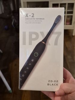 Two Sonic NEW Electric Toothbrushes