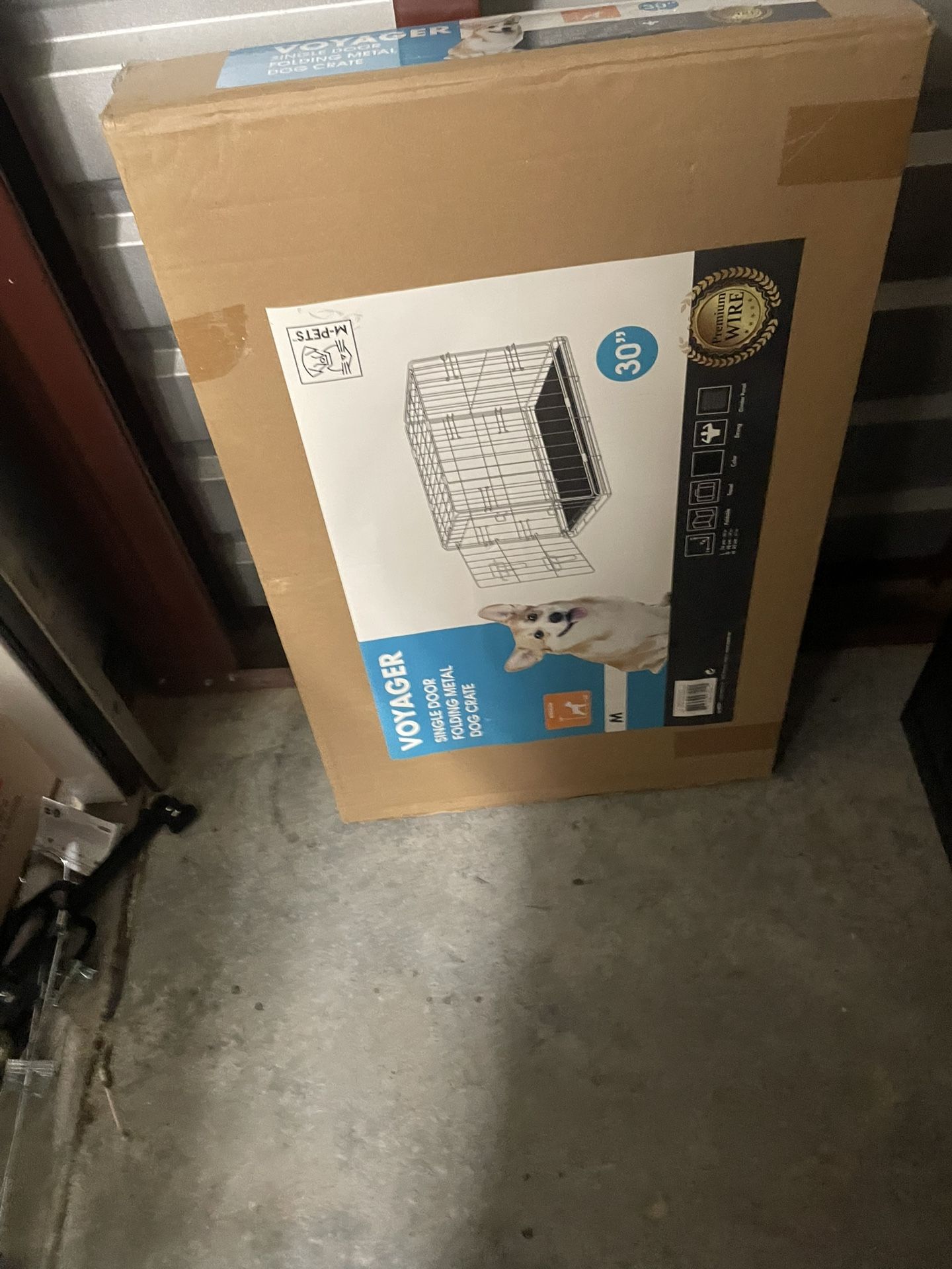 Never opened kennel and 2 unworn pup coats.