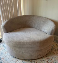 Ashley Furniture - Oversized Swivel Accent Chair in Stone