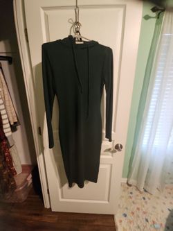 Dark green dress with hood.