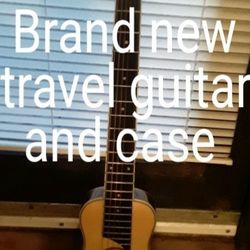 Brand New Travel Guitar And Case 