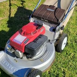 HONDA GAS SELF PROPELLED LANW MOWER WITH BLADE AUTO STOP 