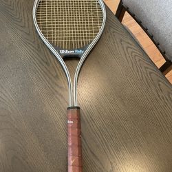 Vintage Wilson Rally Tennis Racquet With Mid Size Grip. 