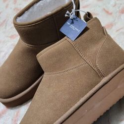 Botas Nuevas .