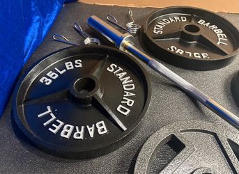 NEW Olympic Equipment Curl Bar of 20# with Cooper Bearings and Plates 2X35s, 2X25s, 2X10s and 2X5s pounds. Brute 170#