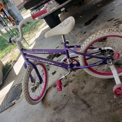 girl huffy bike with training wheels