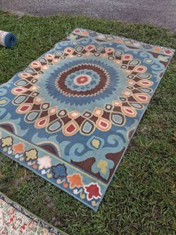 LOTS OF VERY NICE 5 BY 7 AREA RUGS