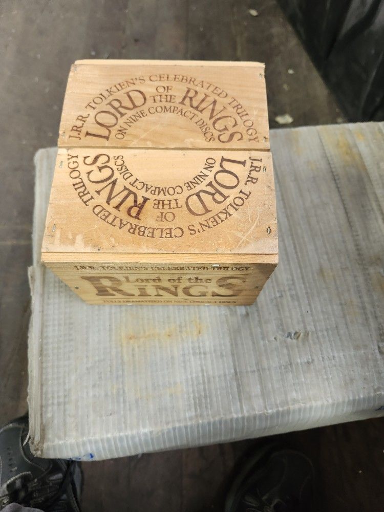 J.R.R. TOLKIENS CELEBRARED TRILOGY LORD of the RINGS FULLY DRAMATIZED on Nine COMPACT DISCS in wooden box 
