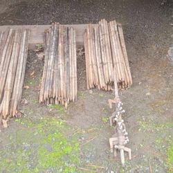 Concrete stakes, brackets and construction fencing