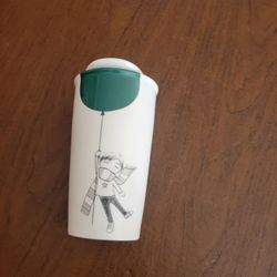 Starbucks 2014 Boy with a Green Balloon White Tumbler Travel Mug Cup & 
Lid 12oz. Perfect shape, like new. It is 6" tall, weight 1lb 3oz  plus 
shippi