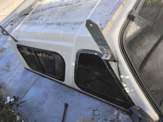 Fiber glass camper shell