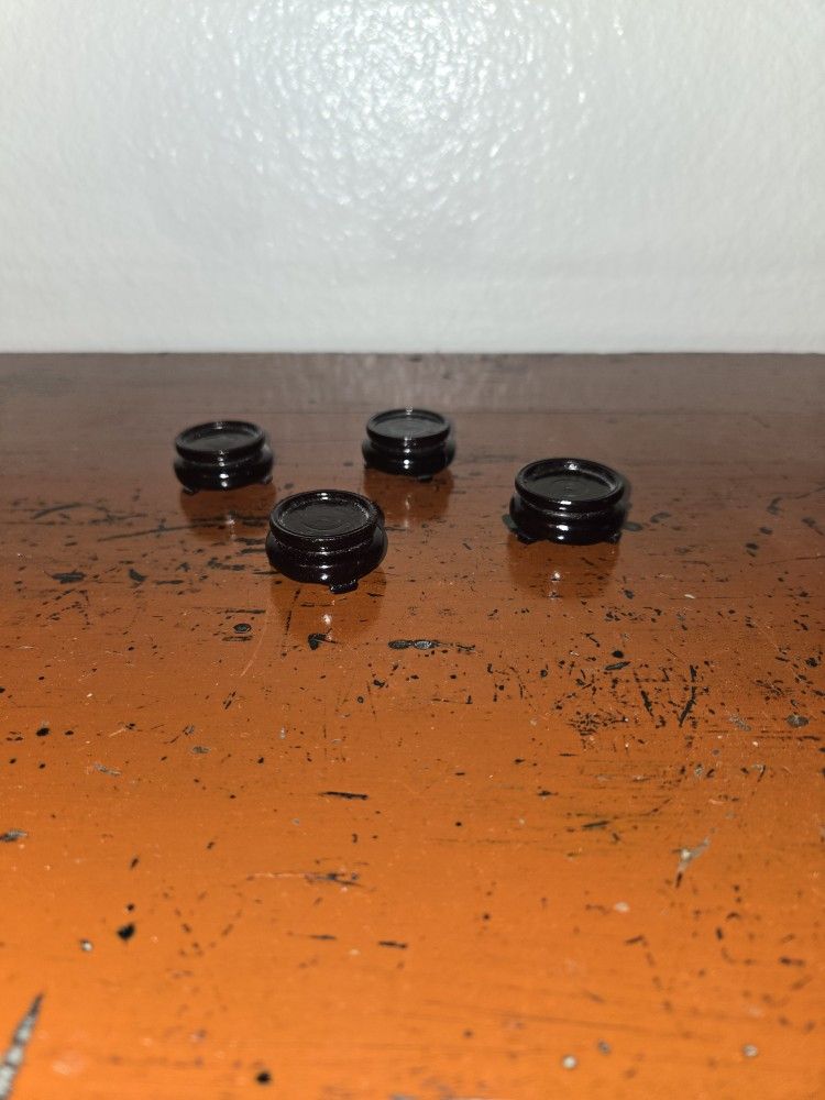 4 Tiny Vintage Chinese Base Stand. Great for tiny Vase Stand.

Overall diameter.  1/2" Height.  1 1/4" round diameter, nothing broken, good condition.