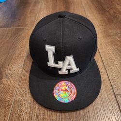 New BullBot brand black snapback cap featuring white embroidered "LA" lettering.