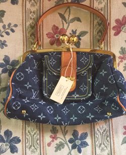 Bolso 👜 de la marca Louis Vuitton Monogram Denim Clutch Purse $1,300 ( brand handbag Louis Vuitton )