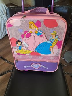 Pink and purple rolling suitcase