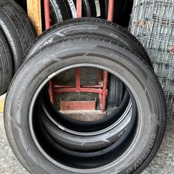 2 Used Tires Hankook Kinergy ST 215/60R17 Just under 60% Tread. 