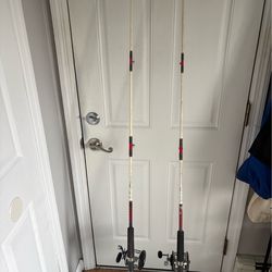Set of 2 Penn 65 longbeach reels fishing poles