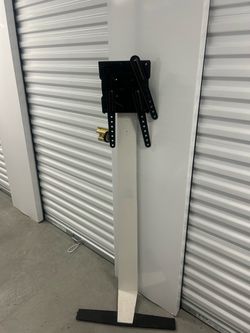 On the black part possibly missing one bracket that mounts tv. Youd hv to get a replacement AVF TV Wall Mount with Column Track. INCOMPLETE