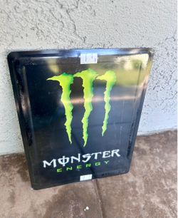 Monster energy drink metal sign.