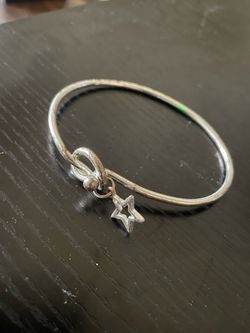 Old silver bracelet with star