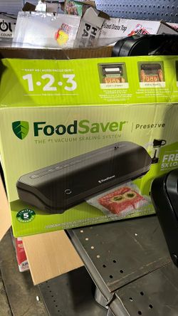 FoodSaver VACUUM SEALING SYSTEM