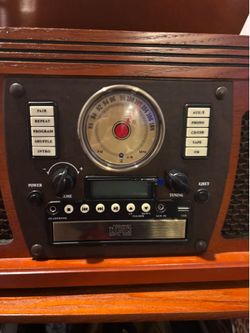 Victrola 8 in 1 record player, stand, and record bundle