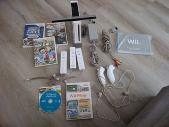 Nintendo Wii system + controllers & games  SOLD AS A BUNDLE DEAL
