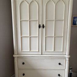 Chris Madden Home Collection armoire in an ivory finish